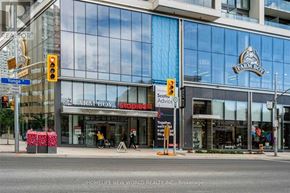 Toronto (Mount Pleasant West) condo for rent - A street view of a building with a sign that says "Fair Boy".