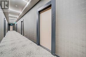 Toronto (Mount Pleasant West) condo for rent - A hallway with a closed door and a number 1037 on the wall.