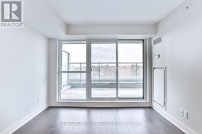 Toronto (Yonge-Eglinton) condo for rent - A room with a large window and a sliding glass door.