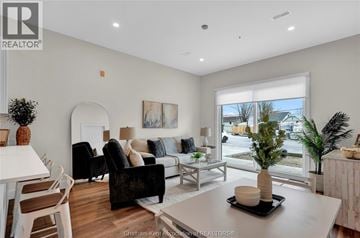 Tilbury apartment for rent - A living room with a white table and a black chair.
