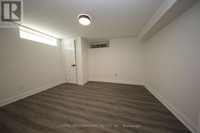 Toronto (Bendale) apartment for rent - A room with a door and a light on the ceiling.