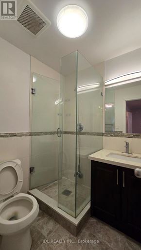 Markham (Grandview) apartment for rent - A bathroom with a toilet, sink, and shower.