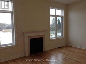Bradford West Gwillimbury (Bradford) apartment for rent - A room with a fireplace and a window.