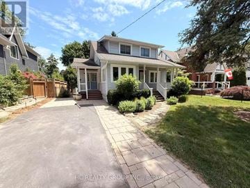 Oakville (Oo Old Oakville) apartment for rent - A house with a driveway in front of it.