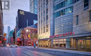 Toronto (Church-Yonge Corridor) condo for rent - A city street with a Maltage Hotel on the right.