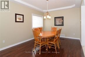 Hamilton (Meadowlands) apartment for rent - A dining room with a wooden table and chairs.