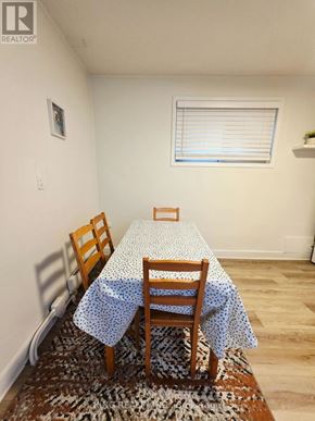 London East (East K) apartment for rent - A dining room with a table and chairs.