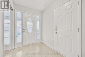 Milton (Wi Willmott) townhouse for rent - A white door with a glass window is in a room.