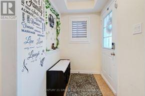 Brampton (Northwest Brampton) apartment for rent - A wall with a quote on it that says "Family Always Smile".