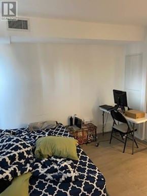 Toronto (Church-Yonge Corridor) condo for rent - A bedroom with a bed, desk, and chair.