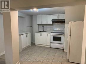 Richmond Hill (Crosby) apartment for rent - A kitchen with white cabinets and appliances is for sale.