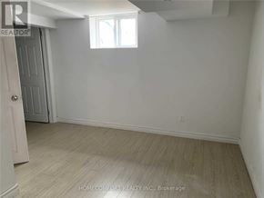 Richmond Hill (Crosby) apartment for rent - A room with a door and a window.