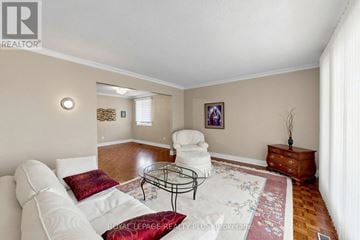 Oakville (Wo West) apartment for rent - A living room with a white couch and a coffee table.