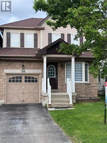 Whitby (Brooklin) apartment for rent - A house with the number 24 on the front door.