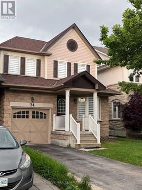 Whitby (Brooklin) apartment for rent - A house with a car parked in front of it.