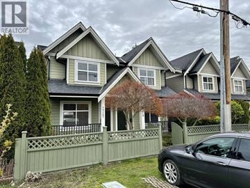 Richmond apartment for rent - A house with a grey car parked in front.
