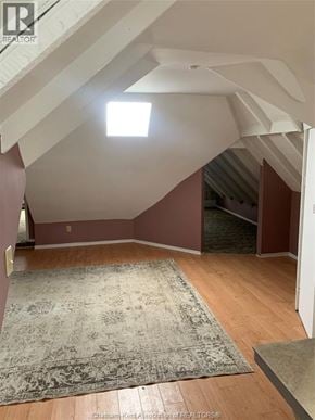 Chatham apartment for rent - A room with a rug on the floor and a skylight above.