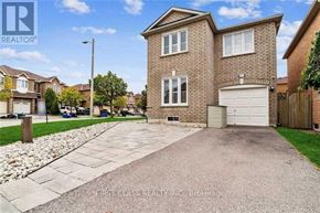 Vaughan (Maple) apartment for rent - A house with a driveway in front of it is for sale.