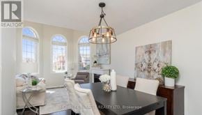 Milton (Ha Harrison) apartment for rent - A well-lit dining area with a table set for four.