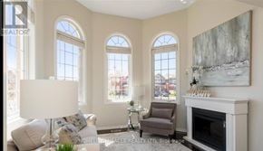 Milton (Ha Harrison) apartment for rent - A living room with a fireplace and a painting on the wall.