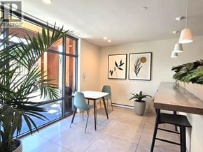 Coquitlam apartment for rent - A dining area with a table and chairs.