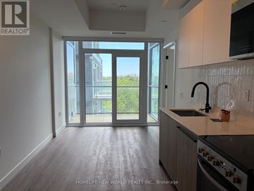 Toronto (Centennial Scarborough) condo for rent - A kitchen with a stove top oven and a sink.