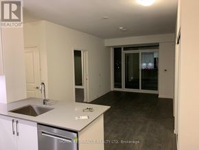 Vaughan condo for rent - A kitchen with a sink, dishwasher, and a window.