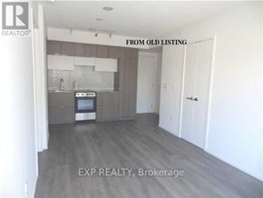 Toronto (Church-Yonge Corridor) condo for rent - A room with a TV and a wall-mounted shelf.