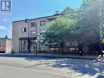 Toronto (Lawrence Park South) condo for rent - A building with a RE/MAX sign on the front.