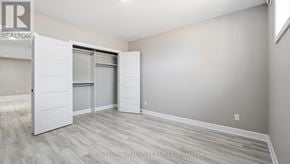 Russell apartment for rent - A room with a sliding door and a white wall.