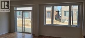 Mount Hope townhouse for rent - A realtor's office with a view of a construction site.
