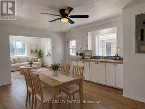 Casselman apartment for rent - A dining room with a table and chairs is shown.