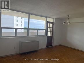 Toronto (Scarborough Village) condo for rent - A room with a window and a radiator.