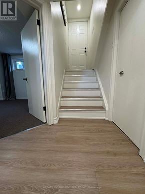 Hamilton (Sunninghill) apartment for rent - A hallway with a staircase leading to the second floor.