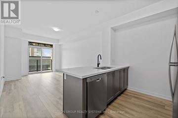 Hamilton (Waterdown) condo for rent - A kitchen with a sink and a countertop.