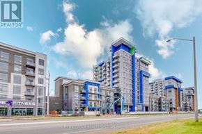 Hamilton (Waterdown) condo for rent - A modern apartment complex with a fitness center is under construction.