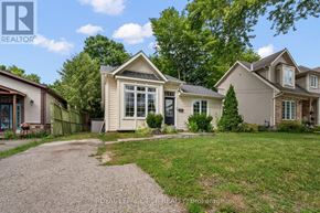 Orangeville apartment for rent - A house with a driveway in front of it.