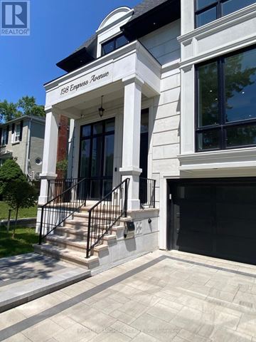 Toronto (Willowdale East) apartment for rent - A white building with a black awning that says 1908 Empress Avenue.