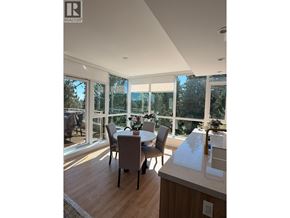 North Vancouver apartment for rent - A dining room with a table and chairs is shown.