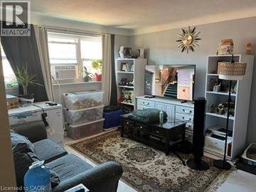 Hamilton apartment for rent - A living room with a grey couch and a black coffee table.