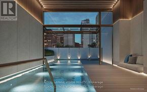 Toronto (Annex) condo for rent - A modern interior space with a pool and a view of the city.