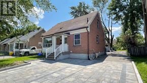 Richmond Hill (Crosby) apartment for rent - A brick house with a white door and a porch.