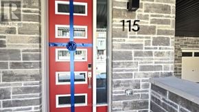 Markham (Victoria Square) townhouse for rent - A red door with a blue ribbon tied around it.