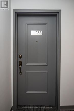 Stratford multi-family for rent - A grey door with the number 253 on it.