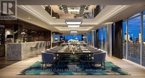 Toronto (Church-Yonge Corridor) condo for rent - A dining room with a long table set for a meal.