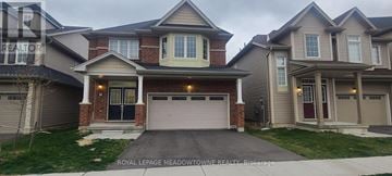 Brantford apartment for rent - A house with a garage is for sale.