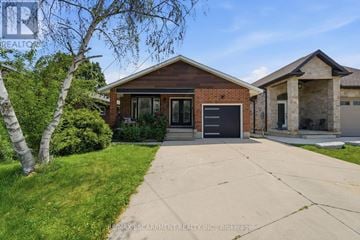 Hamilton (Rolston) apartment for rent - A house with a driveway in front of it.