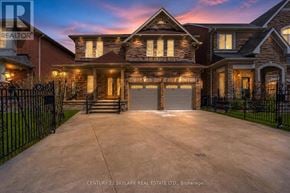 Brampton (Vales Of Castlemore) apartment for rent - A large house with a driveway in front of it.