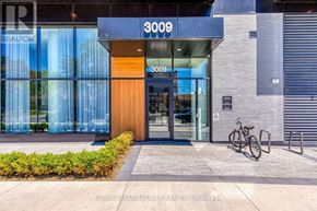 Mississauga (Cooksville) condo for rent - The front of a building with the number 3009 on it.