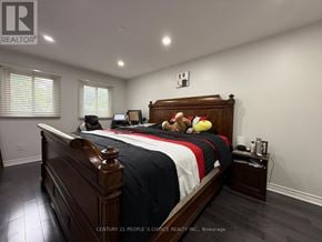 Mississauga (Meadowvale) apartment for rent - A bedroom with a large bed and a teddy bear on it.